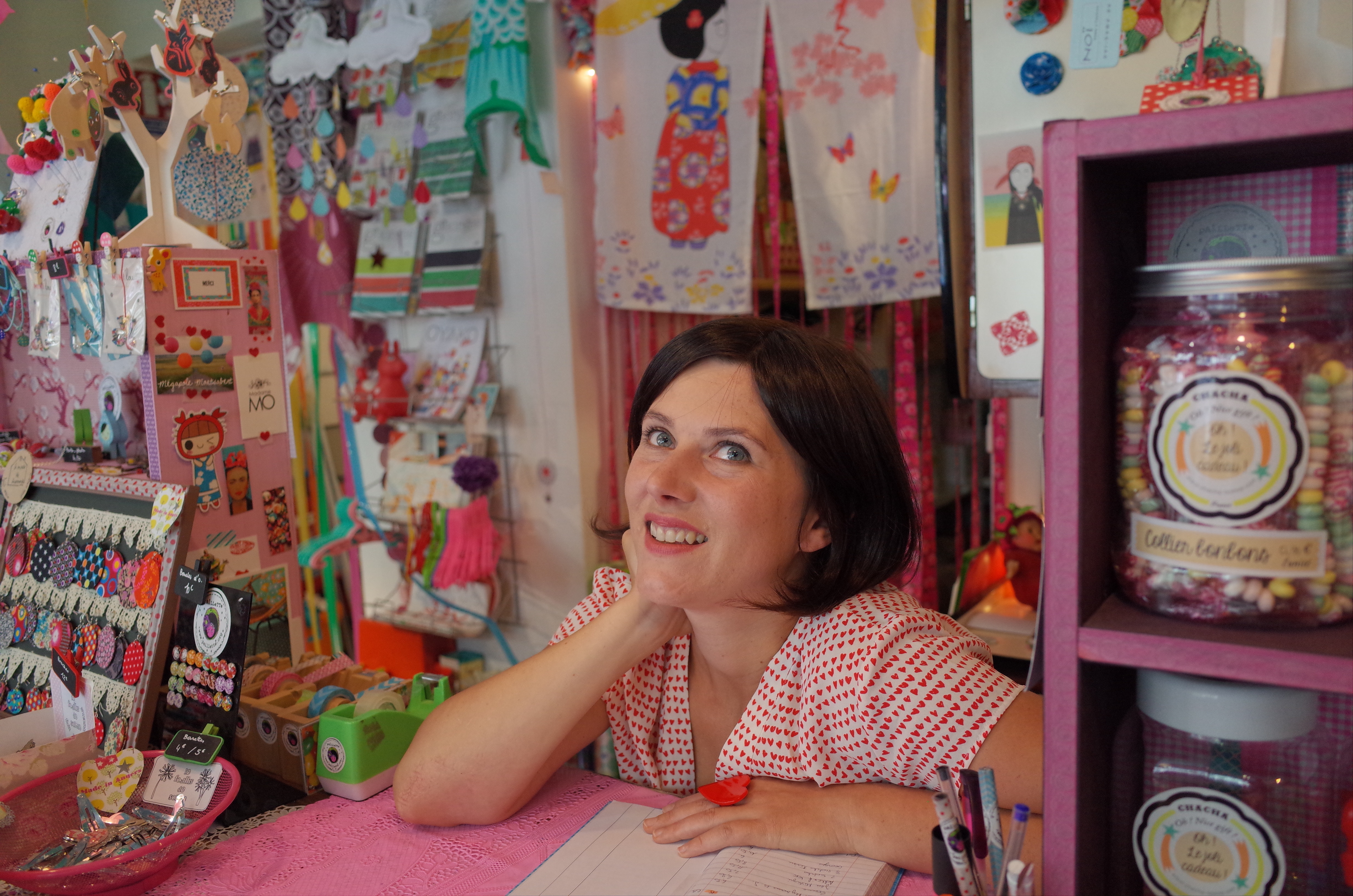Woman dreaming in her shop